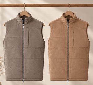Classic Micro Suede Leather Puffer Vests in two colors hanging on a clothing rack.