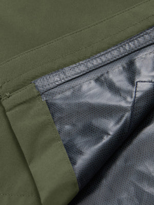 Close-up texture of army green waterproof lightweight rain jacket with hood fabric showing water-repellent weave detail.