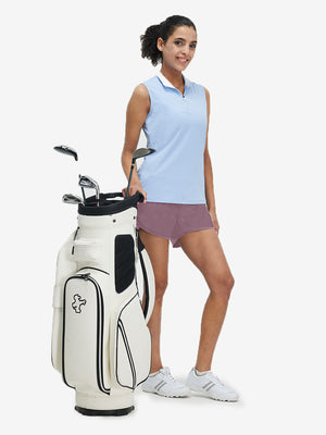 Front full body shot of model wearing lavender pink women's high waist 2 in 1 quick dry shorts with 7 pockets