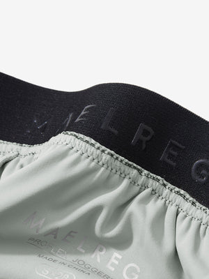 Inside view of waistband on silver gray women's lightweight athletic sweatpants