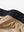 Inside view of waistband on light khaki women's lightweight athletic sweatpants