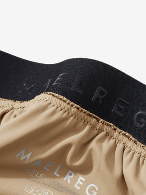 Inside view of waistband on light khaki women's lightweight athletic sweatpants
