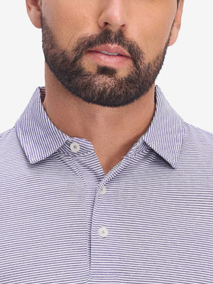 Front view from nose to chest of model wearing light purple white comfy breathable pin-stripe texture golf polos