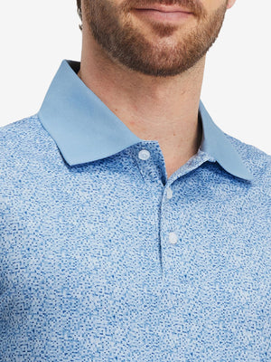 Front view from nose to chest of model wearing blue white abstract maze premium ribbed collar print polo shirts