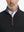 Close-up from nose to chest, showing collar and zipper detail of the black golf pullover.