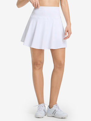 Front lower body shot of model wearing white women's high waisted golf skirts with 4 inner pockets