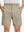 Front lower body shot of model wearing khaki grey flat front flex cotton blend golf shorts