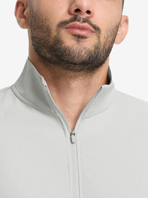 Front view from nose to chest of model wearing silver grey waffle texture 1/4 zip pullover