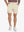 Front lower-body view of model wearing LIGHT KHAKI Water Resistant Versatile 8 Pockets Shorts.