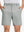Front lower body shot of model wearing rose dust flat front flex cotton blend golf shorts