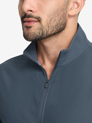 Front view from nose to chest of model wearing dark grey waffle texture 1/4 zip pullover