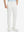 Front lower body shot of model wearing white stretch cotton blend slim fit golf trousers 5 pockets
