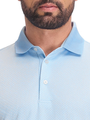 Front shot from nose to chest of model wearing light blue moisture wicking jacquard golf shirts