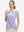 Front upper body shot of model wearing lavender rose women's sleeveless v-neck print golf shirts