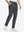 Front lower body shot of model wearing dark grey stretch cotton blend slim fit golf trousers 5 pockets