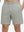 Front lower body shot of model wearing silver gray 4 way stretch breathable workout athletic shorts