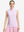 Front upper body shot of model wearing pink purple stripes women's sleeveless q-zip print quick dry golf tops