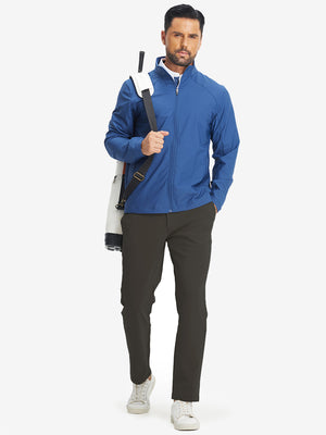 Full-body shot of model with golf bag on back wearing coffee water-resistant stretch heat-tech winter trousers