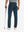 Rear lower-body: model in navy stretch quick dry casual golf pants with 4 pockets holding golf club in right hand.