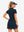 Back upper body view in navy of women's lightweight golf dress with 2 pockets.