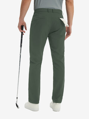 Rear lower-body: model in grey green stretch quick dry casual golf pants with 4 pockets holding golf club in right hand.