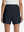 Back lower body shot of model wearing navy blue women's gym golf shorts with liner pocket