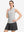 Front upper body shot of model wearing light grey white women's q-zip pin striped texture golf shirts