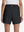 Back lower body shot of model wearing black women's gym golf shorts with liner pocket