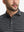 Front shot from nose to chest of model wearing stretch limo/ltgrey heather non-curl ribbed collar striped polo shirts