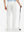 Back lower body shot of model wearing white stretch cotton blend slim fit golf trousers 5 pockets