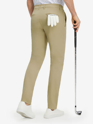 Back lower body shot of model wearing khaki stretch cotton blend slim fit golf trousers 5 pockets