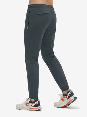 Back view of dark grey superion softness mesh joggers with zipper pockets