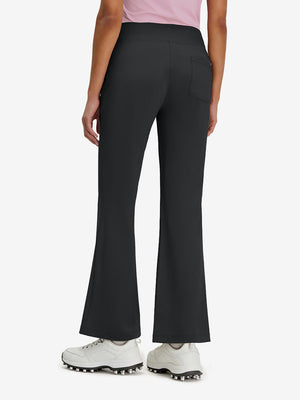 Back lower body shot of model wearing black women's high waist stretch golf pants with pockets