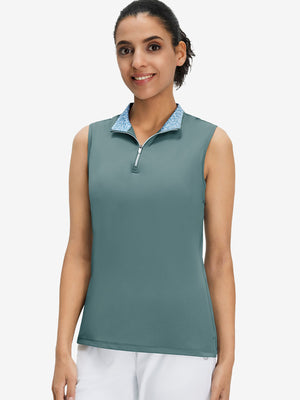 Front upper body shot of model wearing dusty blue women's athletic quarter zip tank tops