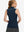 Back upper body shot of model wearing navy women's athletic quarter zip tank tops