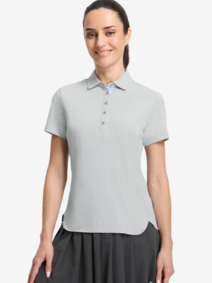 Front upper body shot of model wearing light grey women's 5 buttons collared polo shirts