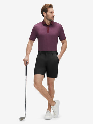 Front full body shot of model wearing dark charcoal flat front hybrid golf shorts