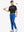 Full body front view of model wearing COBALT Water Resistant Everyday Pants, holding a golf club
