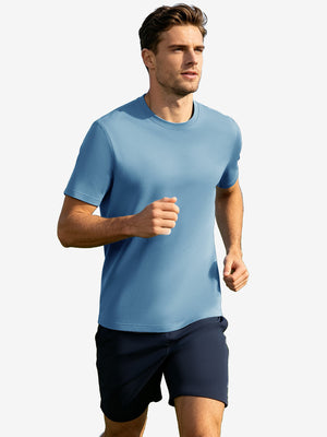 Running front full body view in light blue of men's short sleeve slim fit roma knit t-shirt.
