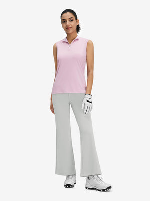 Front full body shot of model wearing silver gray women's high waist stretch golf pants with pockets