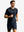 Running front full body view in navy of men's short sleeve slim fit roma knit t-shirt.