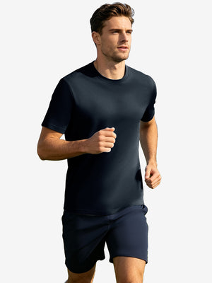 Running front full body view in navy of men's short sleeve slim fit roma knit t-shirt.
