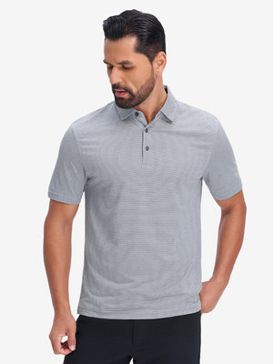 Front half body shot of model wearing navy white comfy breathable pin-stripe texture golf polos