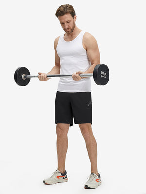 Front full body shot of model exercising in black 4 way stretch breathable workout athletic shorts