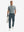 Full-body front: model in grey blue stretch quick dry casual golf pants with 4 pockets carrying golf bag by hand.