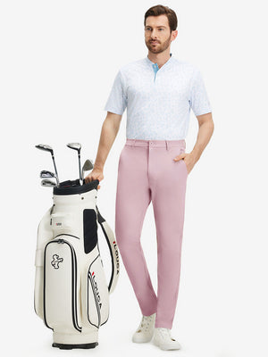 Front full body shot of model wearing pink stretch cotton blend slim fit golf trousers 5 pockets