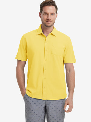 Model half-body front view wearing yellow cotton blend plain shirt.