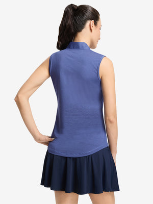 Back upper body shot of model wearing light blue navy women's q-zip pin striped texture golf shirts