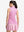 Back upper body shot of model wearing white pink geometric women's sleeveless q-zip print quick dry golf tops