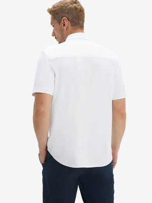 Back upper body shot of model wearing white cool print plain button up shirts